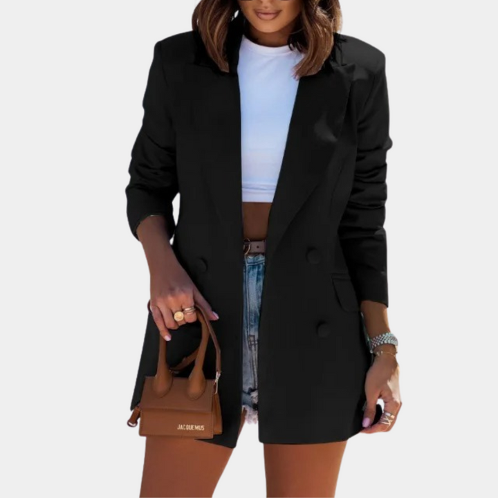 Stylish double-breasted women's long blazer. Tailored for professional office wear & chic fall/spring fashion.