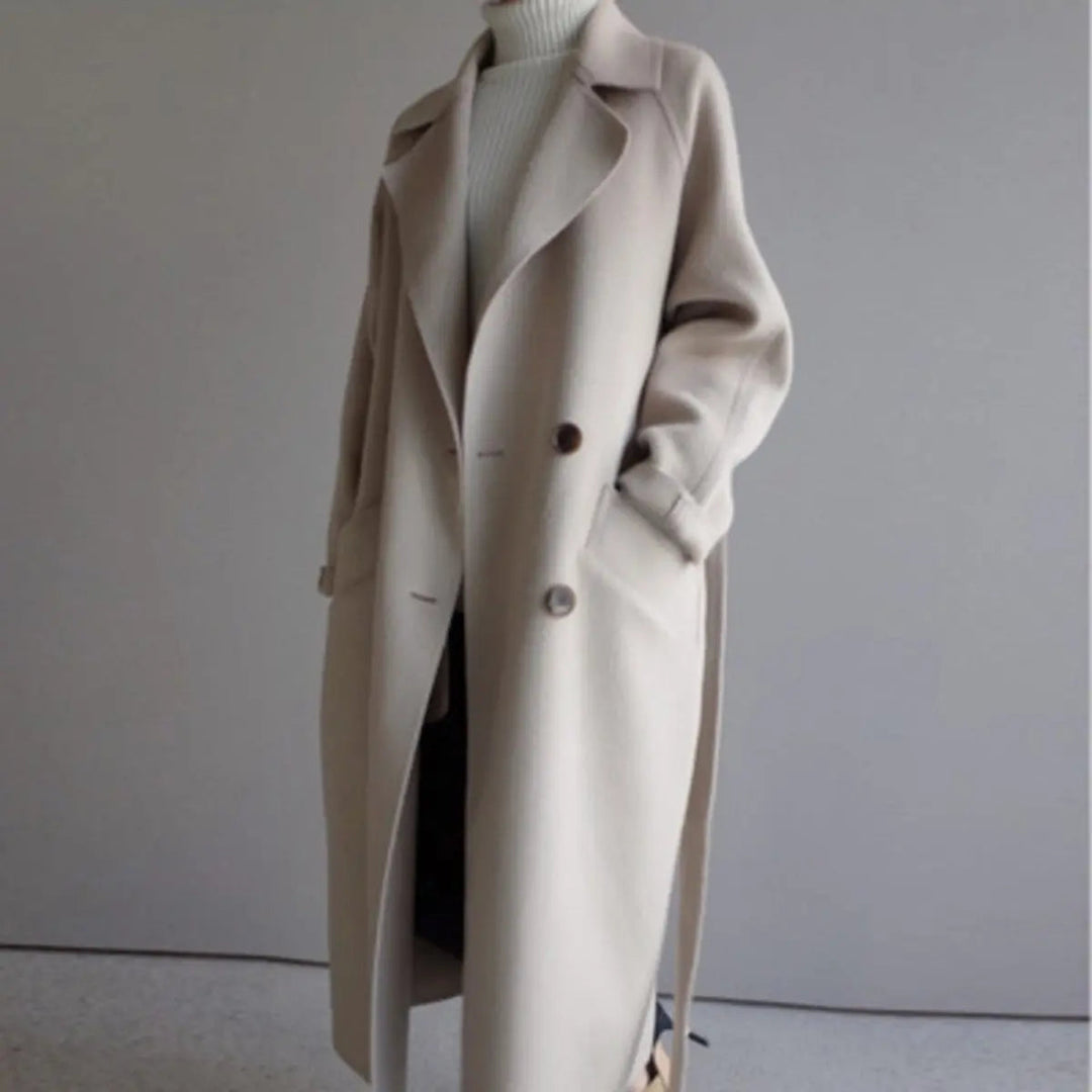 Luxurious women's cashmere long coat. Double-breasted overcoat, elegant and warm for classic winter style.