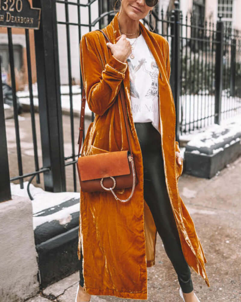 Chic women's long duster cardigan, essential fall & winter layering piece for elegant comfort.