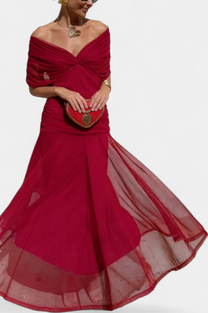Full-length shot of a women's elegant floral V-neck maxi dress, long, flowing, and ready for parties.