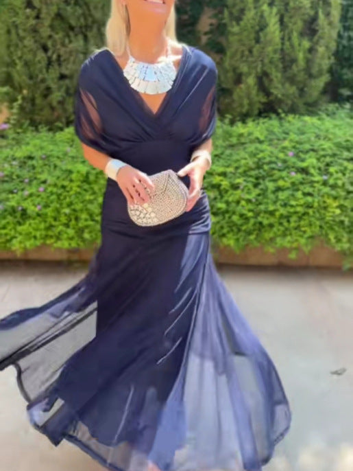 Versatile women's long floral V-neck maxi dress, elegant and flowing for various summer occasions.
