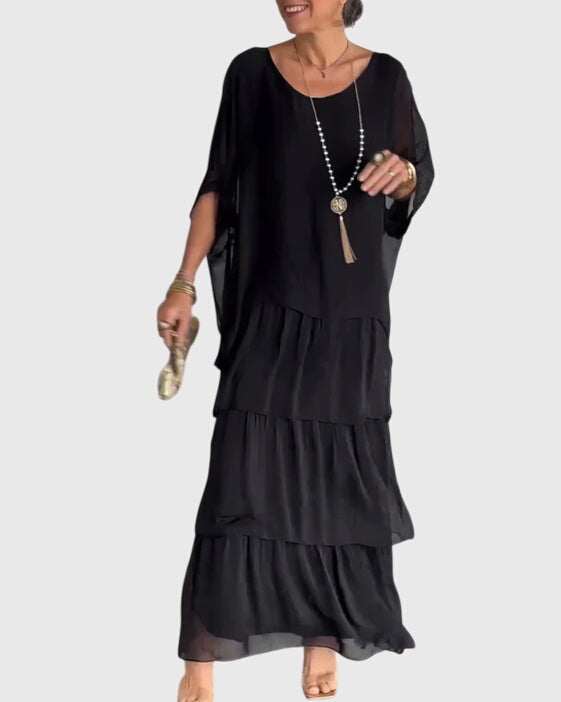 Sophisticated women's long maxi dress, featuring a flowing design for elegant casual wear.