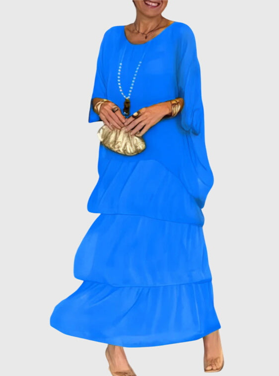 Women's long versatile maxi dress, an elegant flowing option for both party and everyday wear.