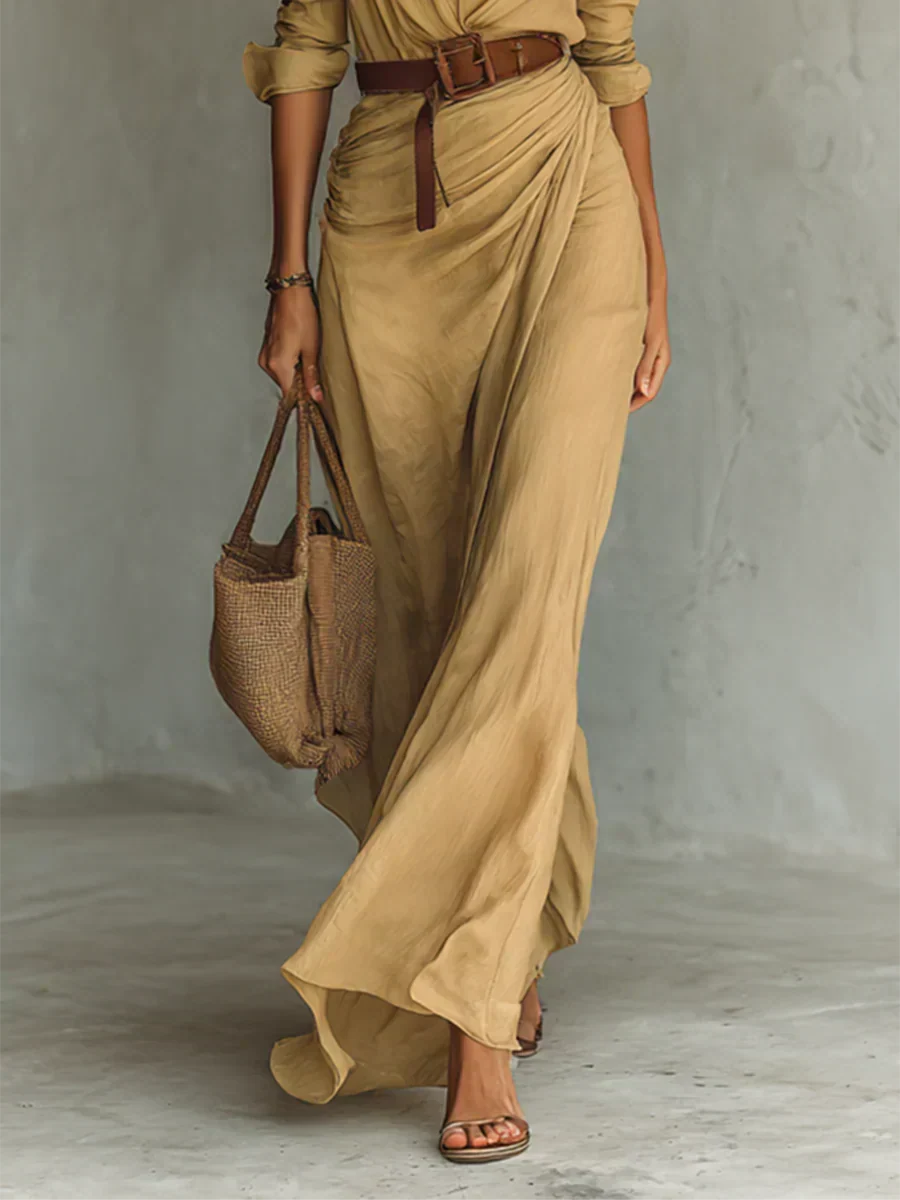 Chic women's V-neck wrap maxi dress with long sleeves and a stylish belt. Versatile for elegant autumn/winter looks.