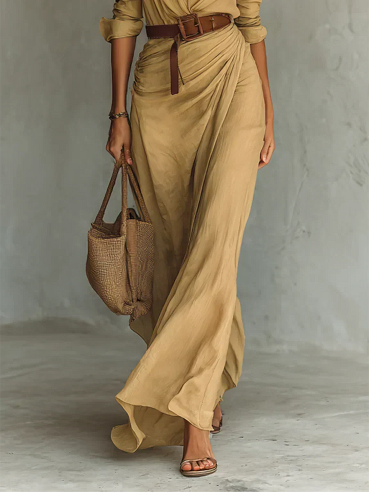 Chic women's V-neck wrap maxi dress with long sleeves and a stylish belt. Versatile for elegant autumn/winter looks.