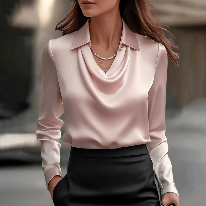 Sophisticated long sleeve blouse for women, an elegant top for professional workwear.