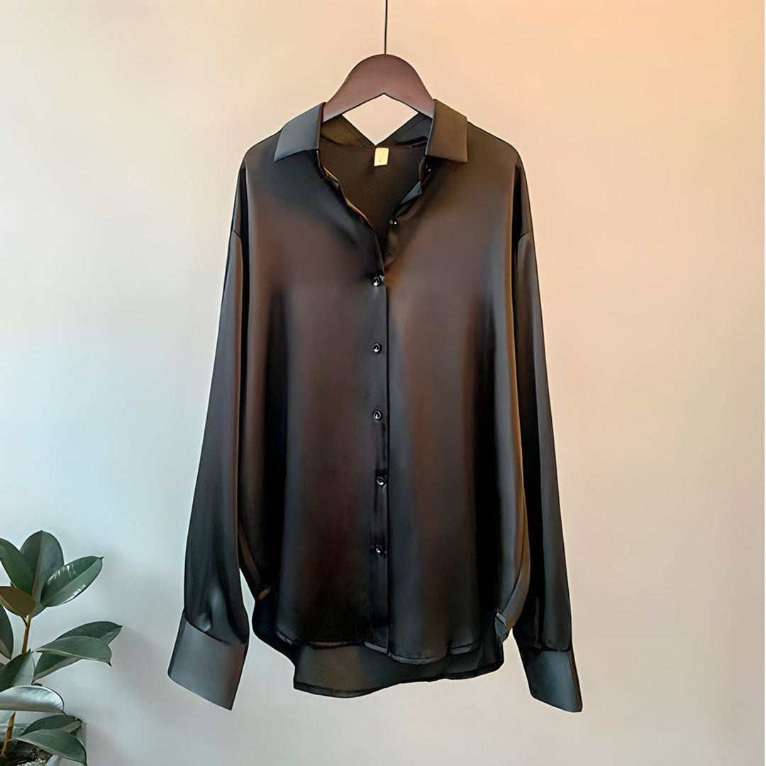Black & white elegant women's long sleeve blouse. Versatile office wear or casual chic fashion top for all seasons.