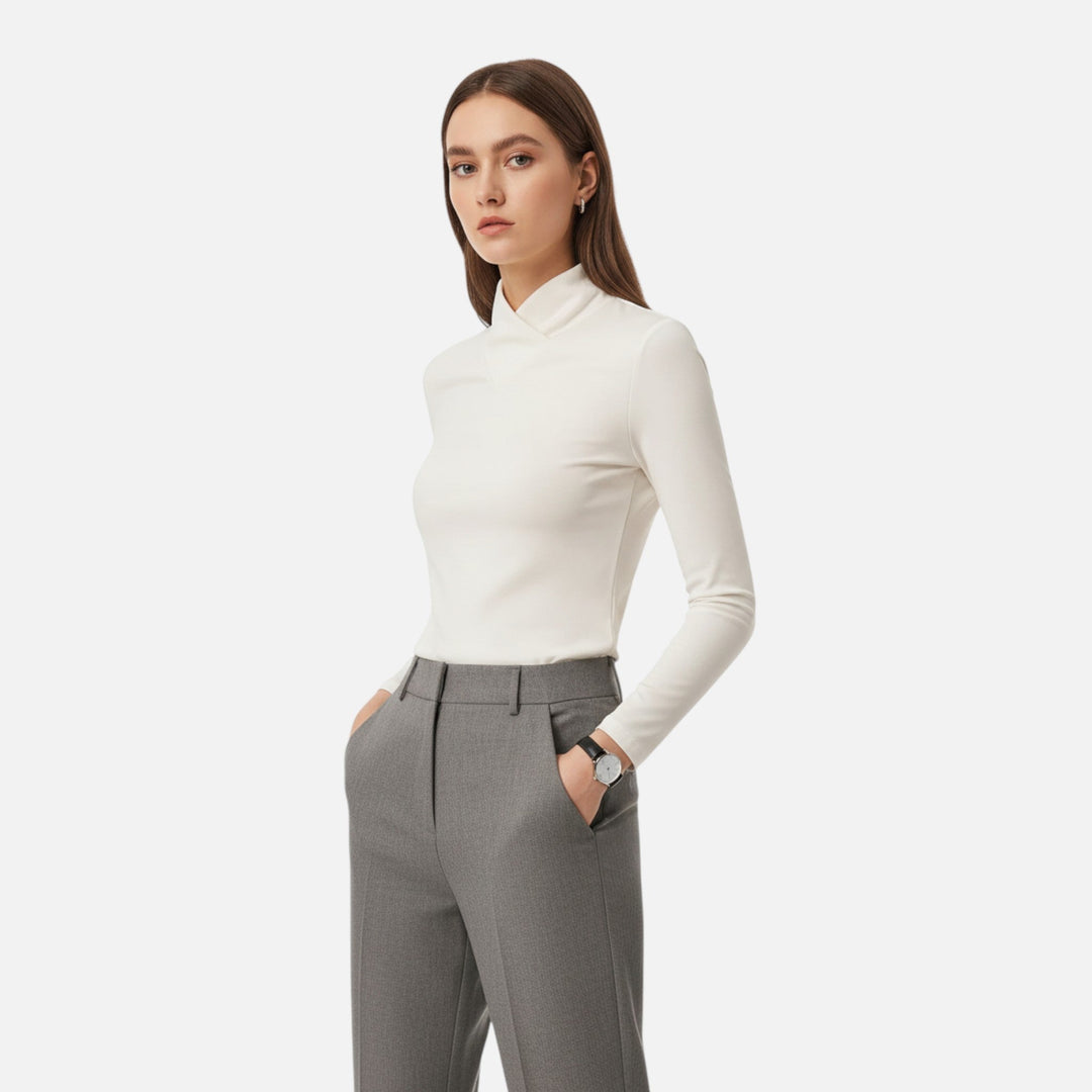 Versatile criss-cross neck blouse for women, perfect for elegant fall and winter fashion.