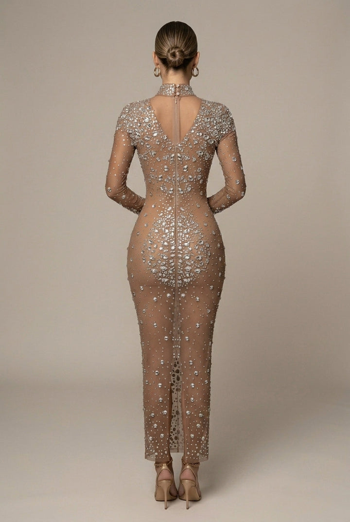 Fitted women's bodycon maxi dress with long sleeves and shimmering rhinestones, ideal for party wear & formal events.