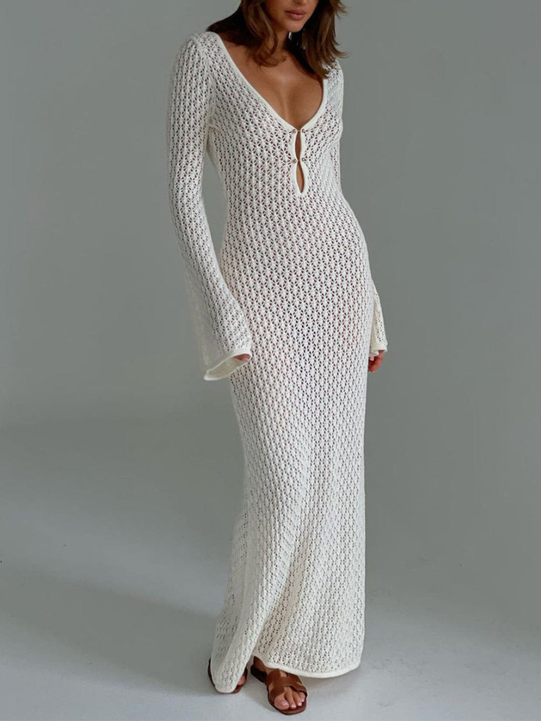 Elegant women's long sleeve button front maxi dress. Perfect for versatile casual or lounge wear.
