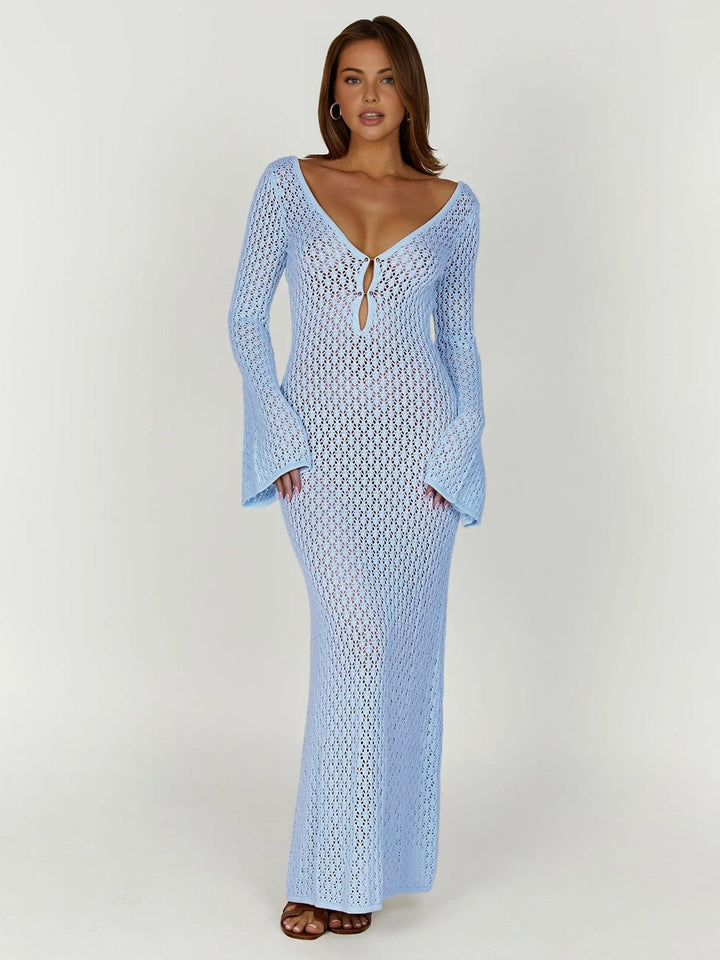 Full length view of a women's long sleeve button front maxi dress, designed for elegance & comfort.