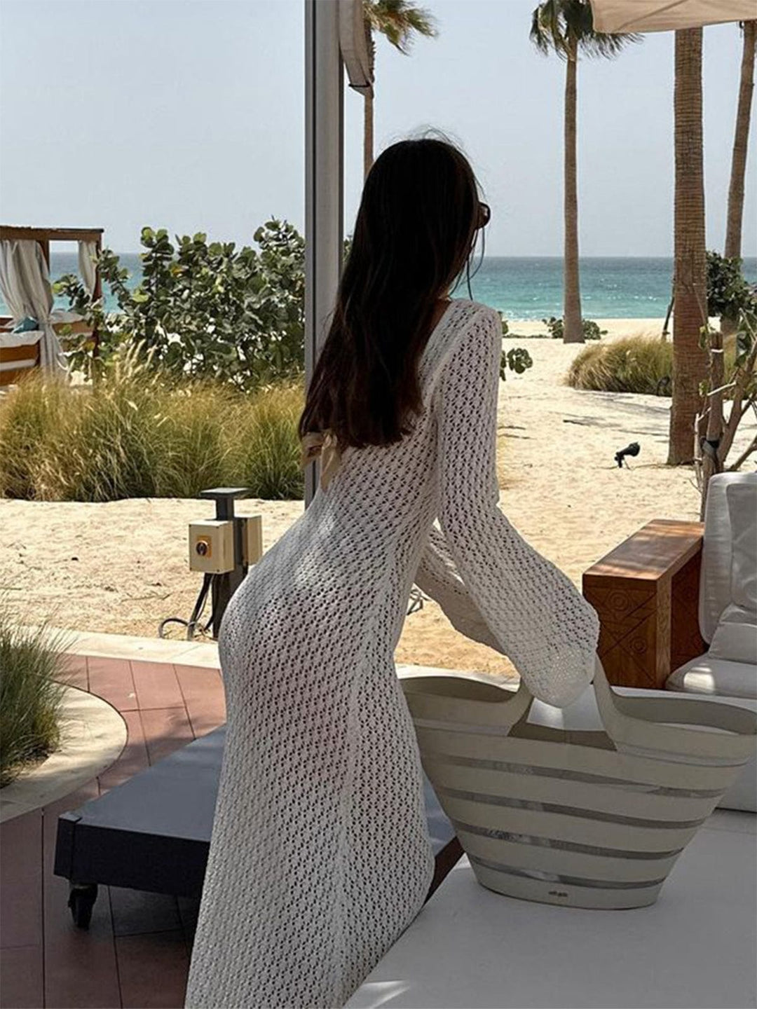 Women's elegant long sleeve maxi dress with full button front, perfect for a refined look.