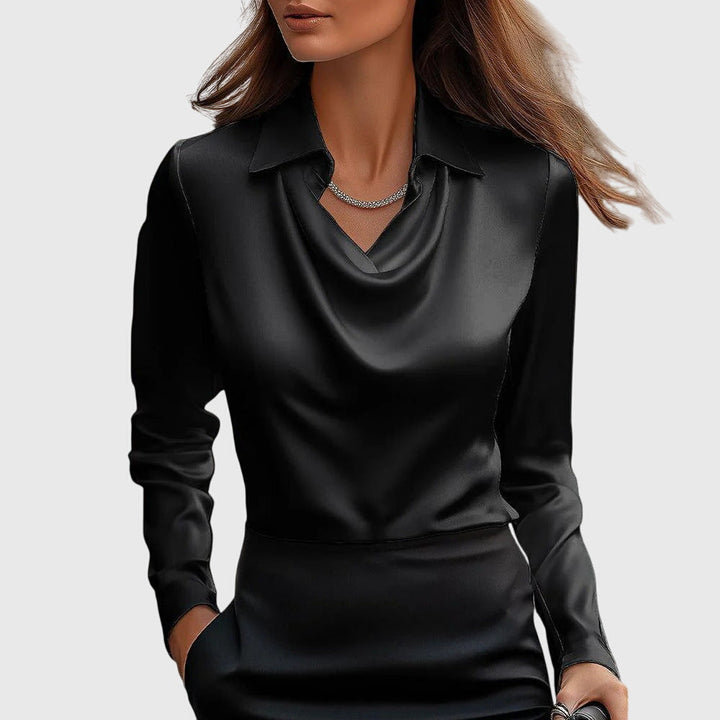 Chic women's long sleeve blouse with a stylish collared design. An elegant, relaxed fit top for everyday fashion.