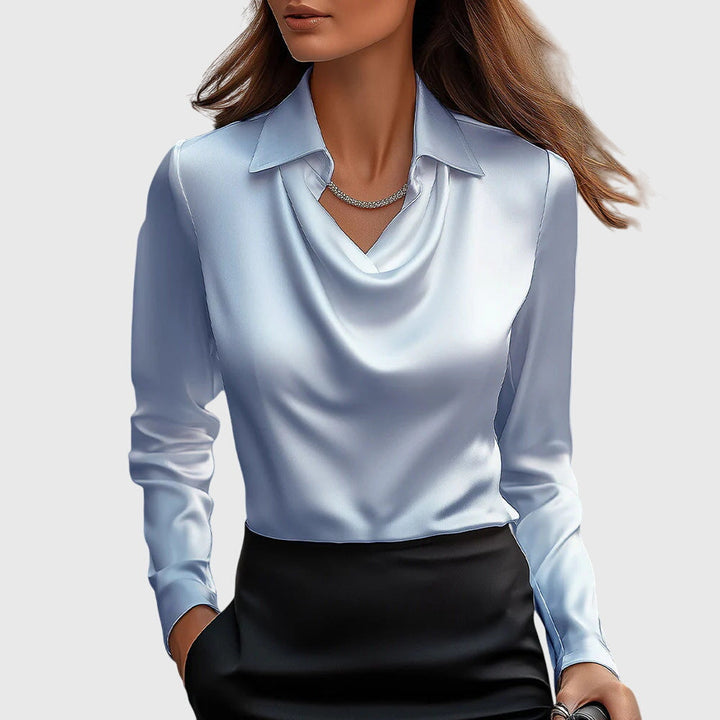 Sophisticated women's elegant long sleeve collared blouse, designed with a relaxed fit for comfortable office or casual style.