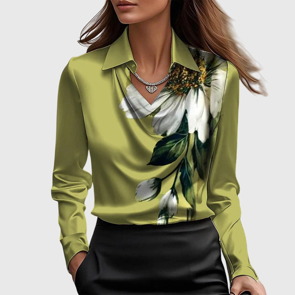 Stylish women's long sleeve collared top, perfect for an elegant relaxed fit in cooler weather or office environments.