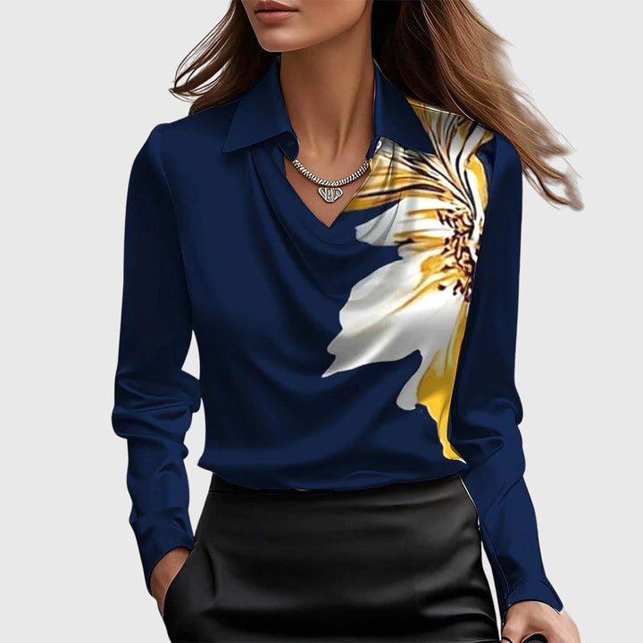 Professional yet relaxed fit long sleeve collared blouse for women. An elegant top perfect for office wear or chic casual.