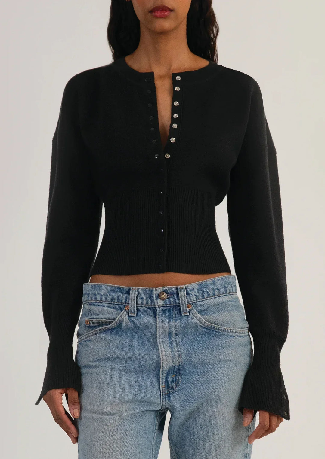 Fashionable women's button-up cardigan, perfect as a cropped long sleeve top.
