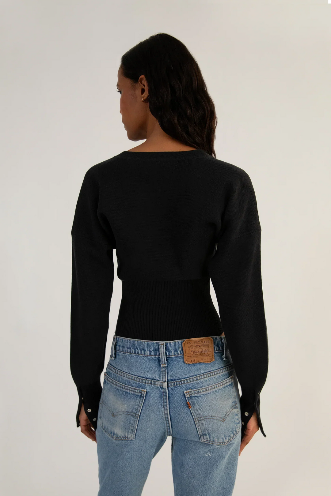 Chic and versatile women's fashion: long sleeve cropped button-up knit cardigan.