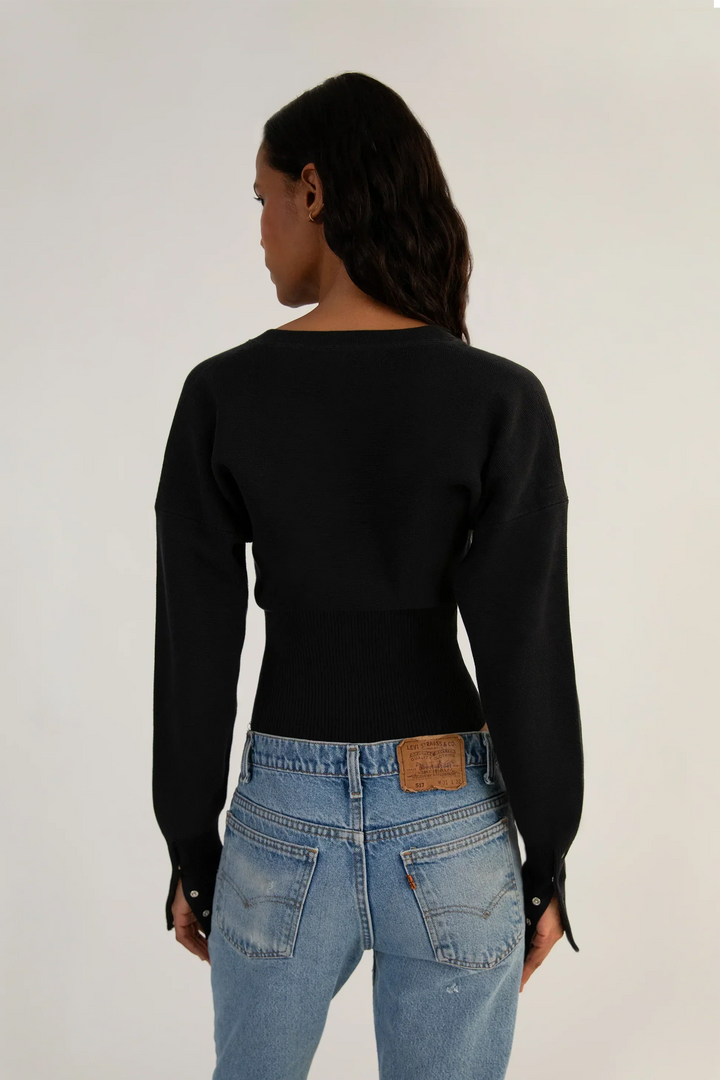 Chic and versatile women's fashion: long sleeve cropped button-up knit cardigan.