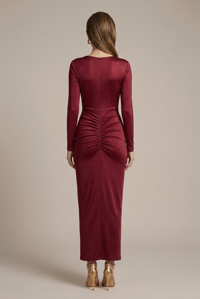 Glamorous women's party maxi dress, deep V-neck, long sleeves, with a distinctive twist waist and front slit.