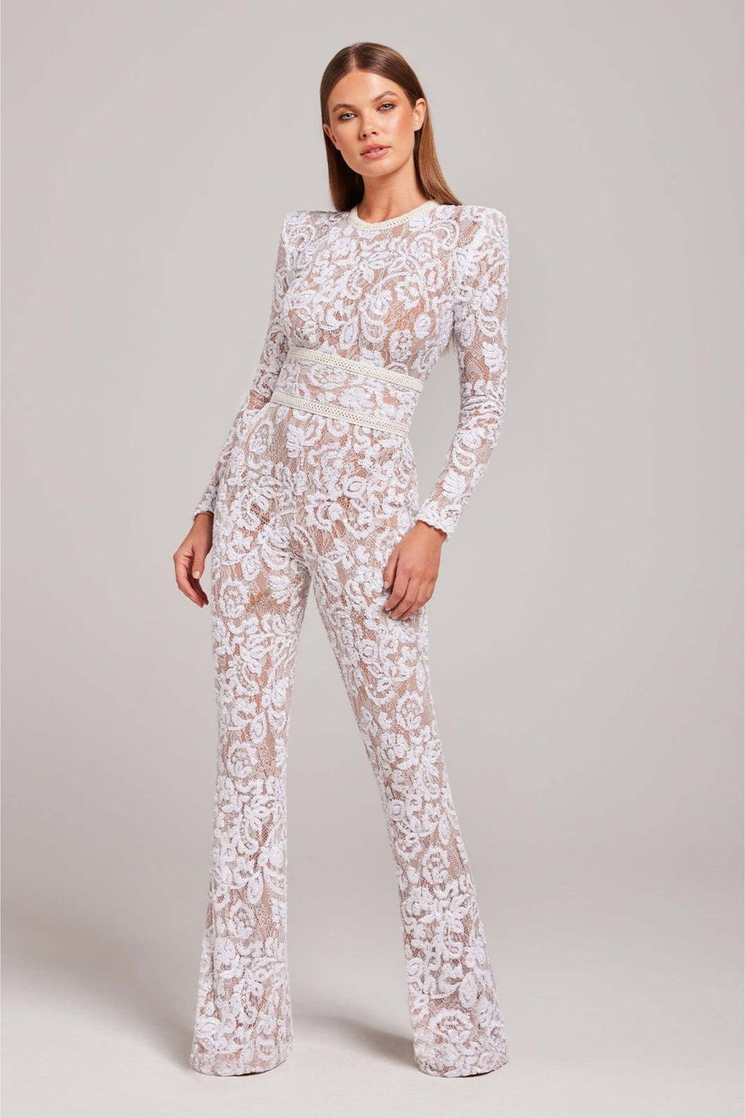 Elegant women's fitted jumpsuit with long sleeves, a sophisticated option for evening wear.