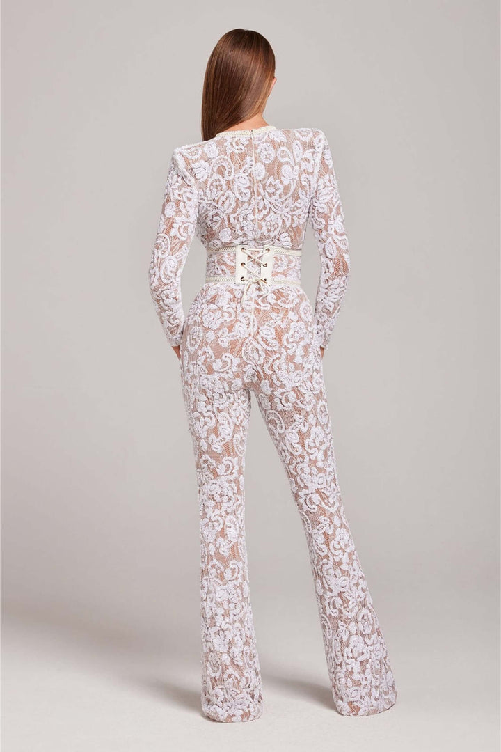 Versatile long sleeve fitted jumpsuit for women, ideal for elegant evening wear or a chic party look.