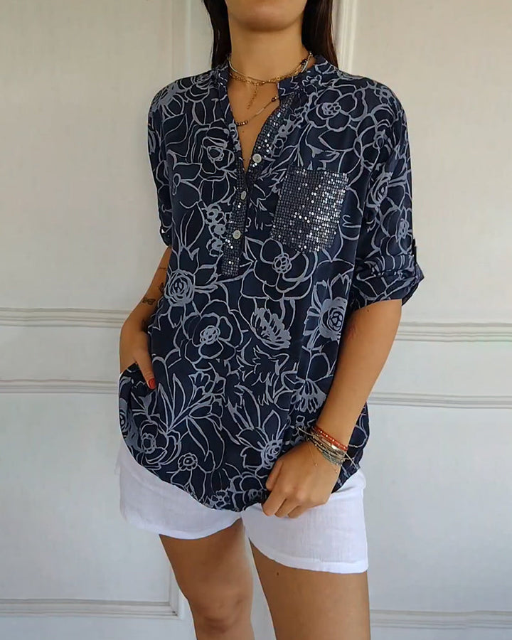 Dark blue sophisticated floral blouse. Women's long sleeve elegant top, versatile fashion.