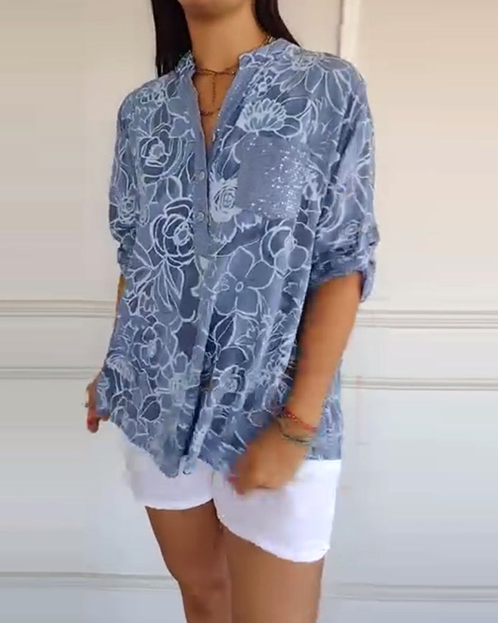 Flattering fit: Women's elegant long sleeve floral blouse. Sophisticated top for versatile fashion.