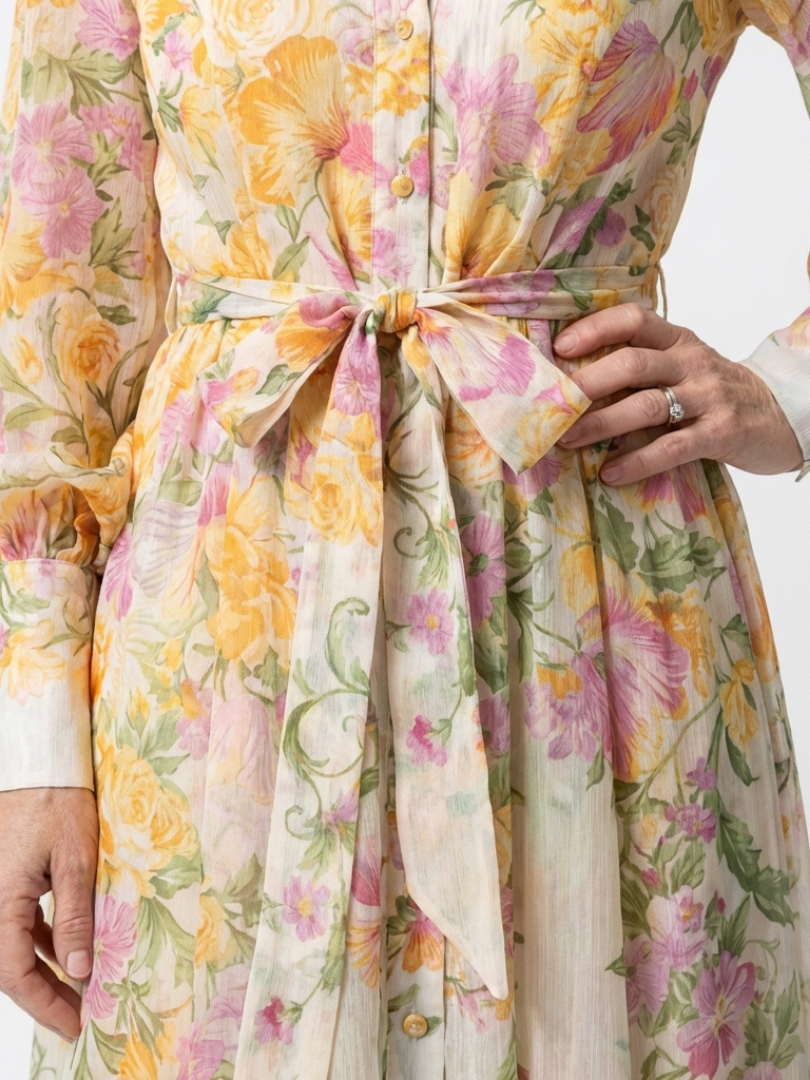 Flowy long sleeve floral maxi dress for women, showcasing a beautiful botanical print & elegant, comfortable fit.