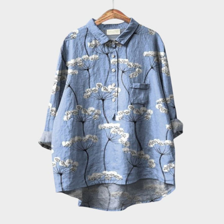 Elegant women's long-sleeve floral print blouse, perfect for office or casual summer fashion.