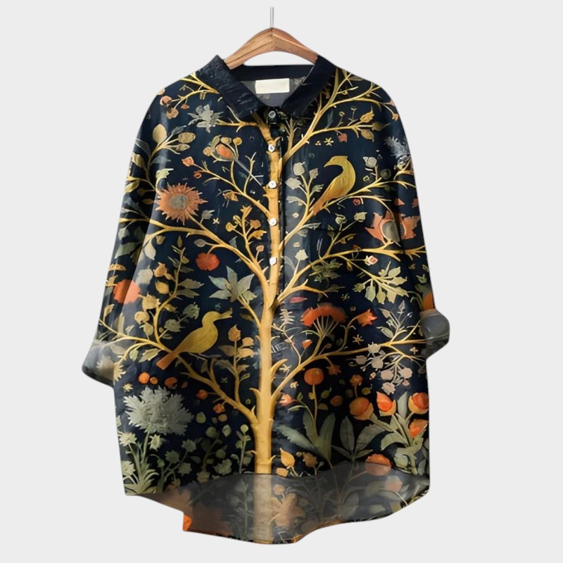 Button-down women's blouse with elegant floral print, versatile for both office & casual wear.