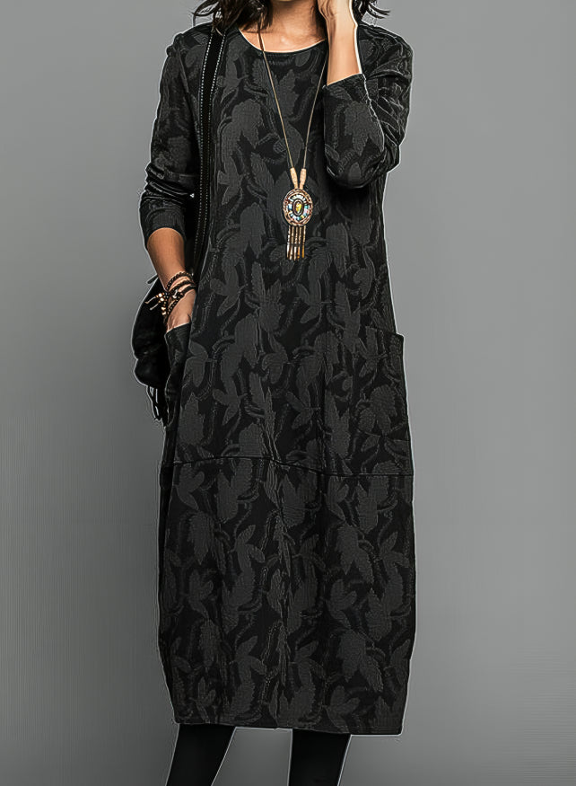 Stylish women's long-sleeve maxi dress. Elegant print and comfortable fit for effortless wear.
