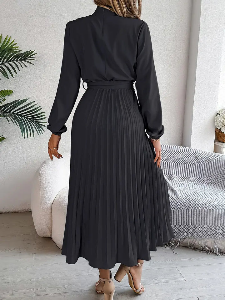 Sophisticated women's long-sleeve midi dress, elegant belted waist for a polished work or formal look.