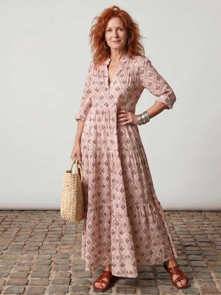 Flowing women's printed long sleeve maxi dress with a sophisticated notch neck, suitable for various occasions.