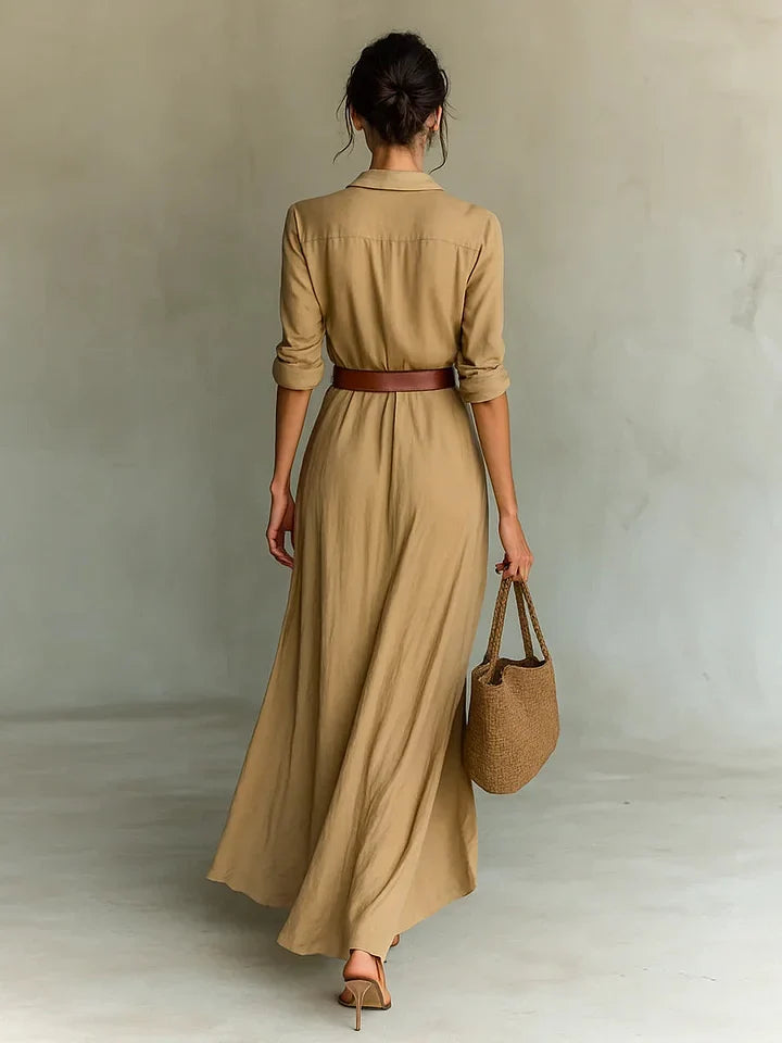 Black women's elegant long sleeve ruched maxi shirt dress, featuring a flattering belt and full button-front.