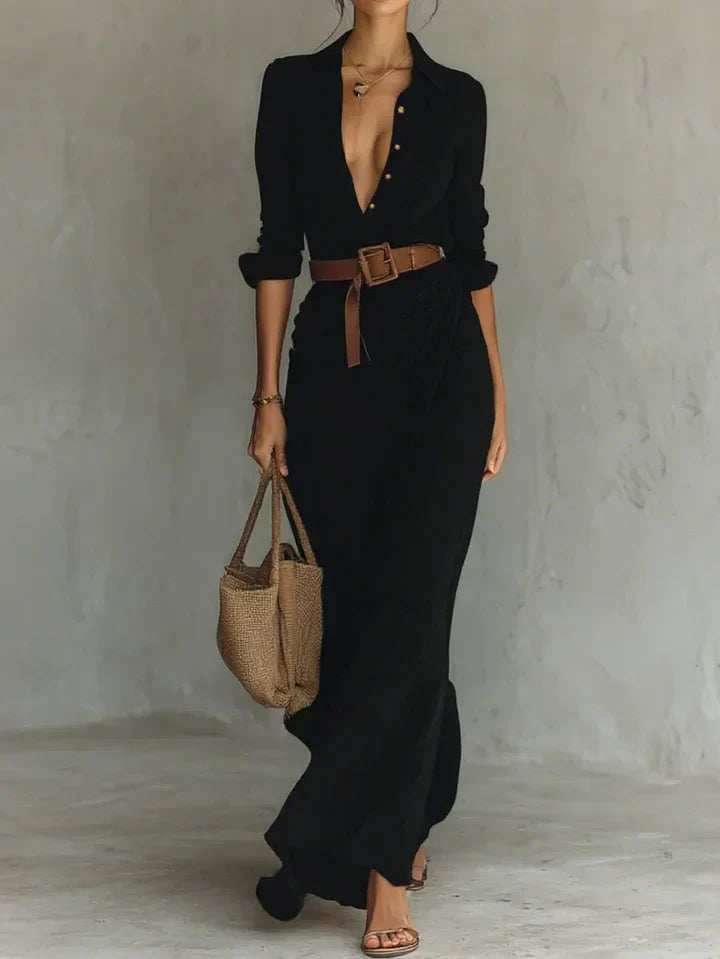 Navy women's elegant long sleeve belted maxi shirt dress, versatile for office wear or smart casual occasions.