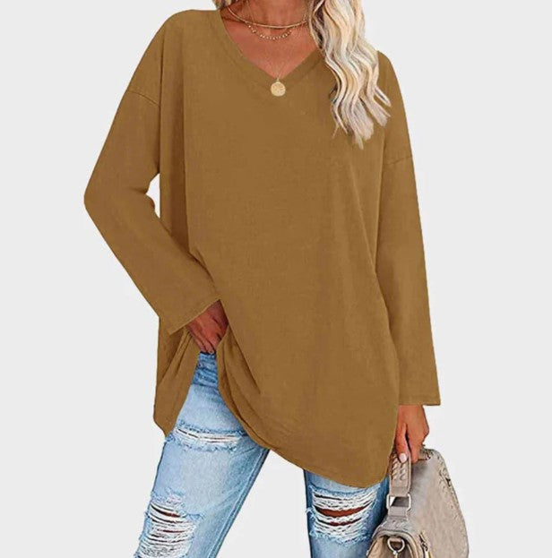 Comfortable women's long sleeve everyday sweater. Elegant knitwear for chic winter warmth.