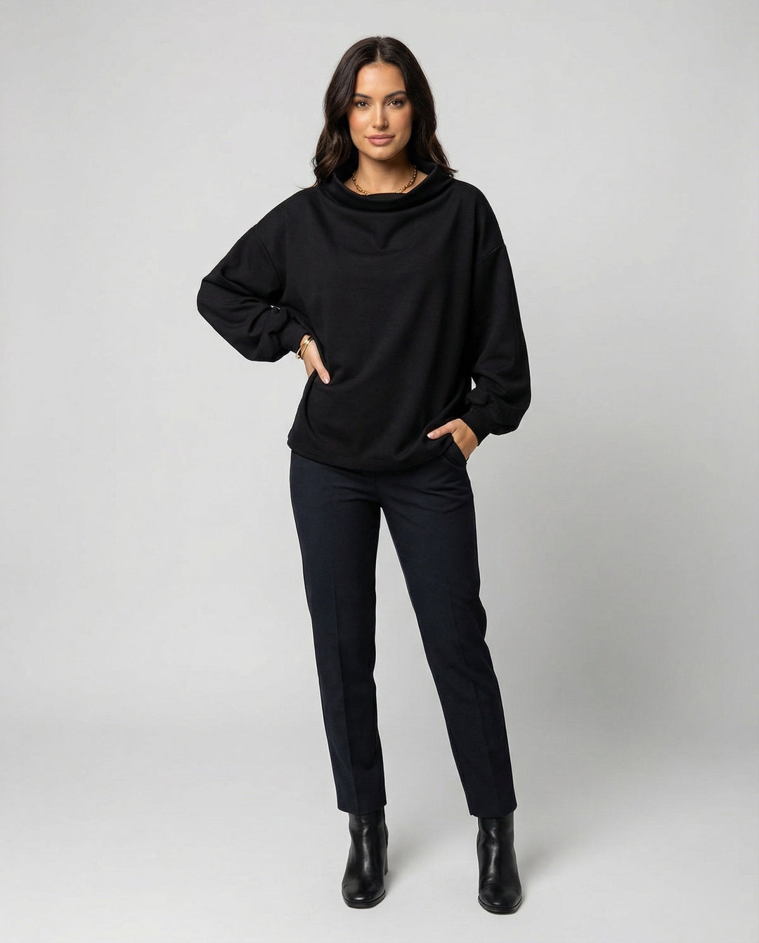 Elegant women's long sleeve sweater with a comfortable fit, perfect for chic casual wear or winter fashion.