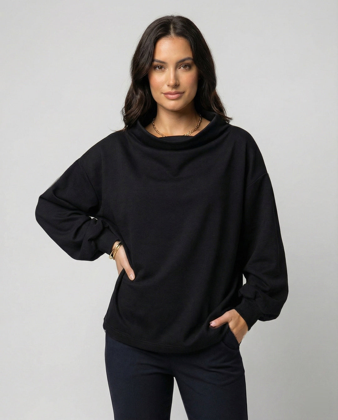 Versatile women's elegant sweater, a comfortable long sleeve top for winter fashion and seasonal wear.