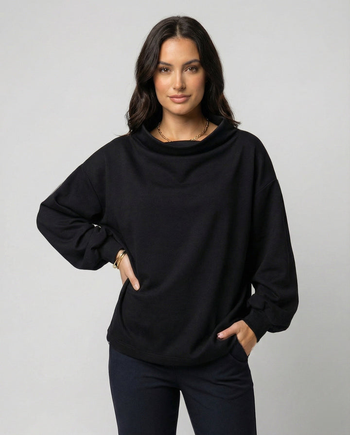 Versatile women's elegant sweater, a comfortable long sleeve top for winter fashion and seasonal wear.