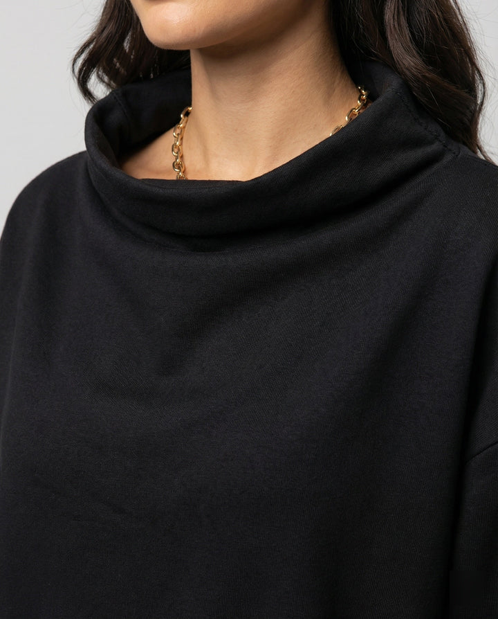 Stylish women's long sleeve elegant sweater, offering comfortable apparel for versatile winter fashion.
