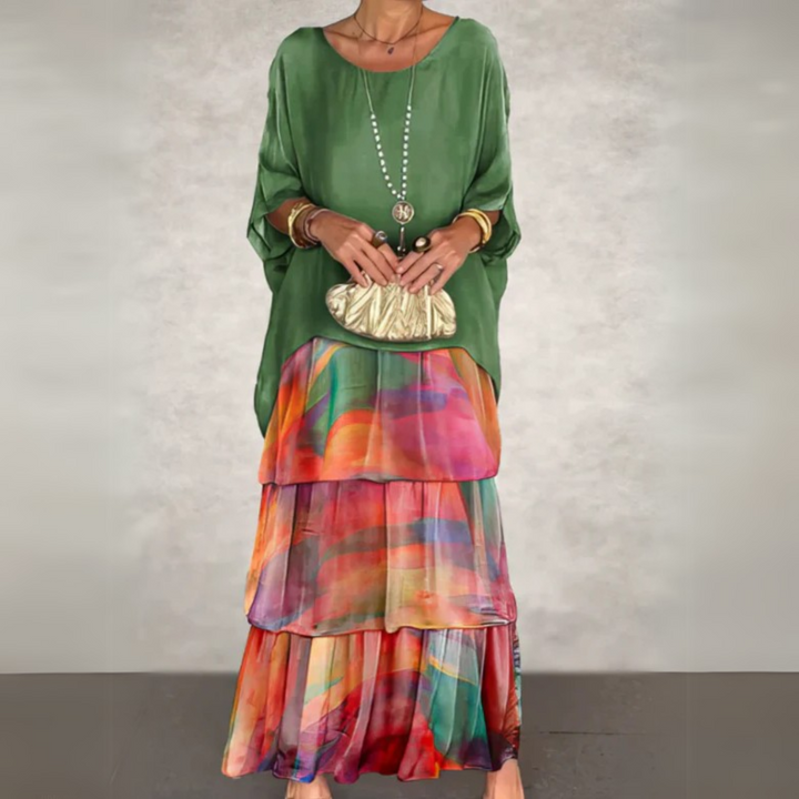 Elegant women's long sleeve tiered maxi dress, flowing style, perfect for spring/summer fashion.