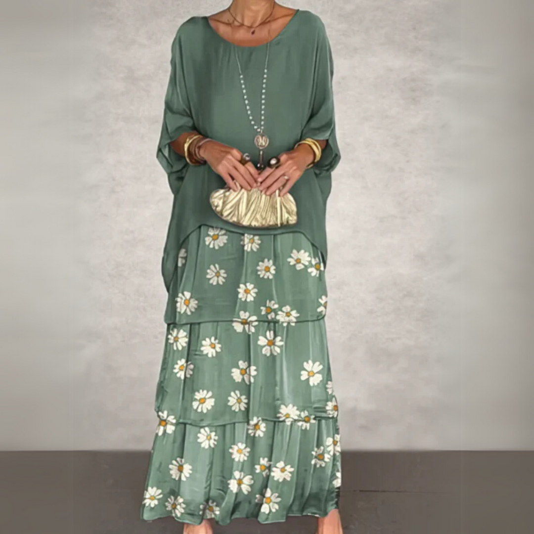 Relaxed fit women's tiered maxi dress with long sleeves, ideal for casual wear or summer events.