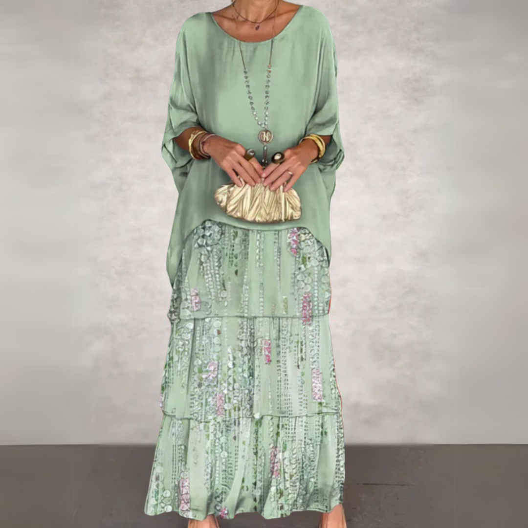 Printed long sleeve tiered maxi dress for women, elegant flowing style, versatile for day or night.
