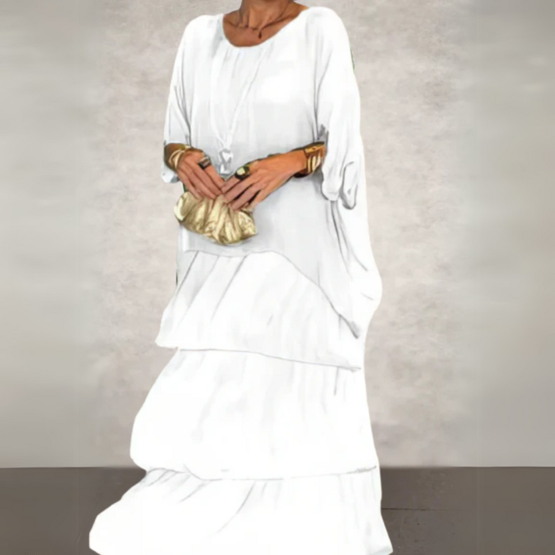 Plus size women's tiered maxi dress, long sleeve, flowing elegant style, comfortable for all body types.