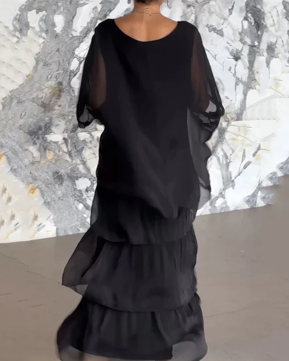 Versatile women's long sleeve tiered maxi dress, elegant flowing design for casual outings or events.