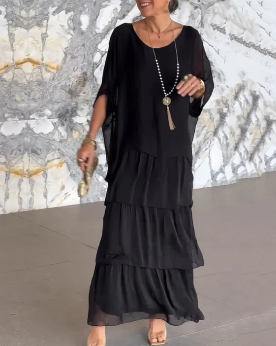 Flowing long sleeve women's maxi dress, elegant tiered design, comfortable for spring & summer style.