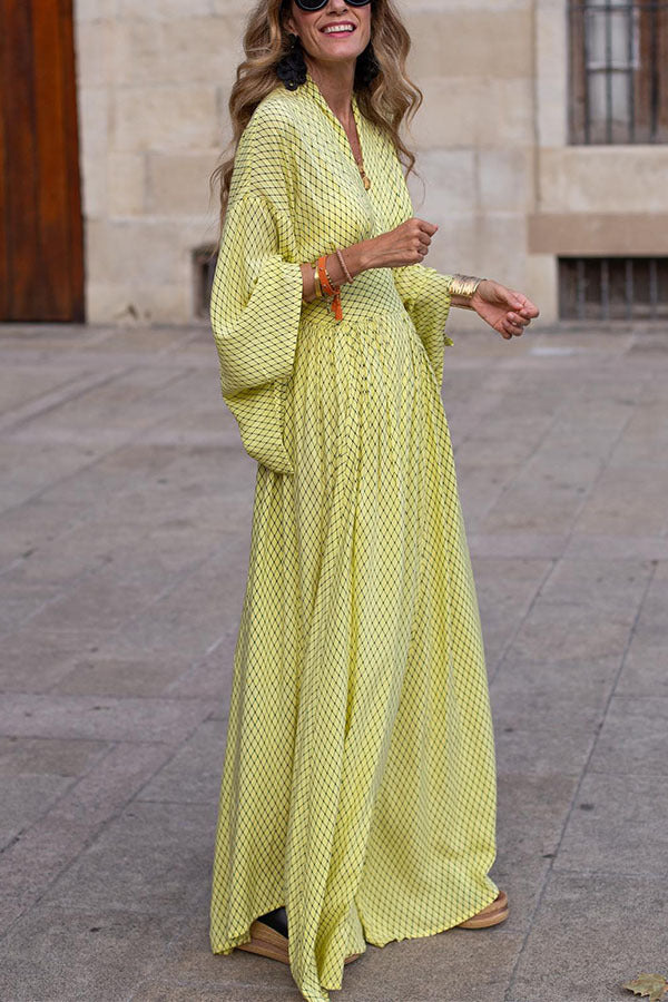 Beautiful green women's long sleeve V-neck midi dress. Versatile elegant smart casual look for autumn or spring.
