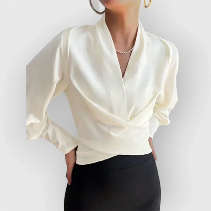 Chic long sleeve wrap blouse for women. A versatile & elegant top suitable for both office and casual fashion.