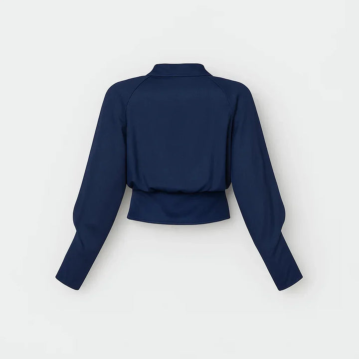 Fashionable women's wrap blouse with long sleeves, offering an elegant look for office environments & casual events.